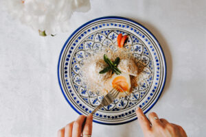 Seafood plate with prawns served on a decorated blue-and-white dish
