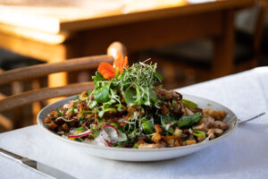 Salad with crispy chicken strips and mixed greens
