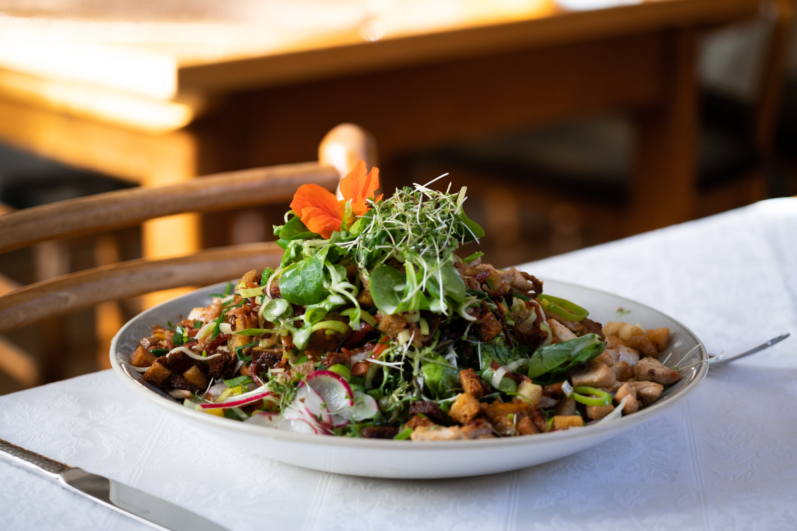 Salad with crispy chicken strips and mixed greens
